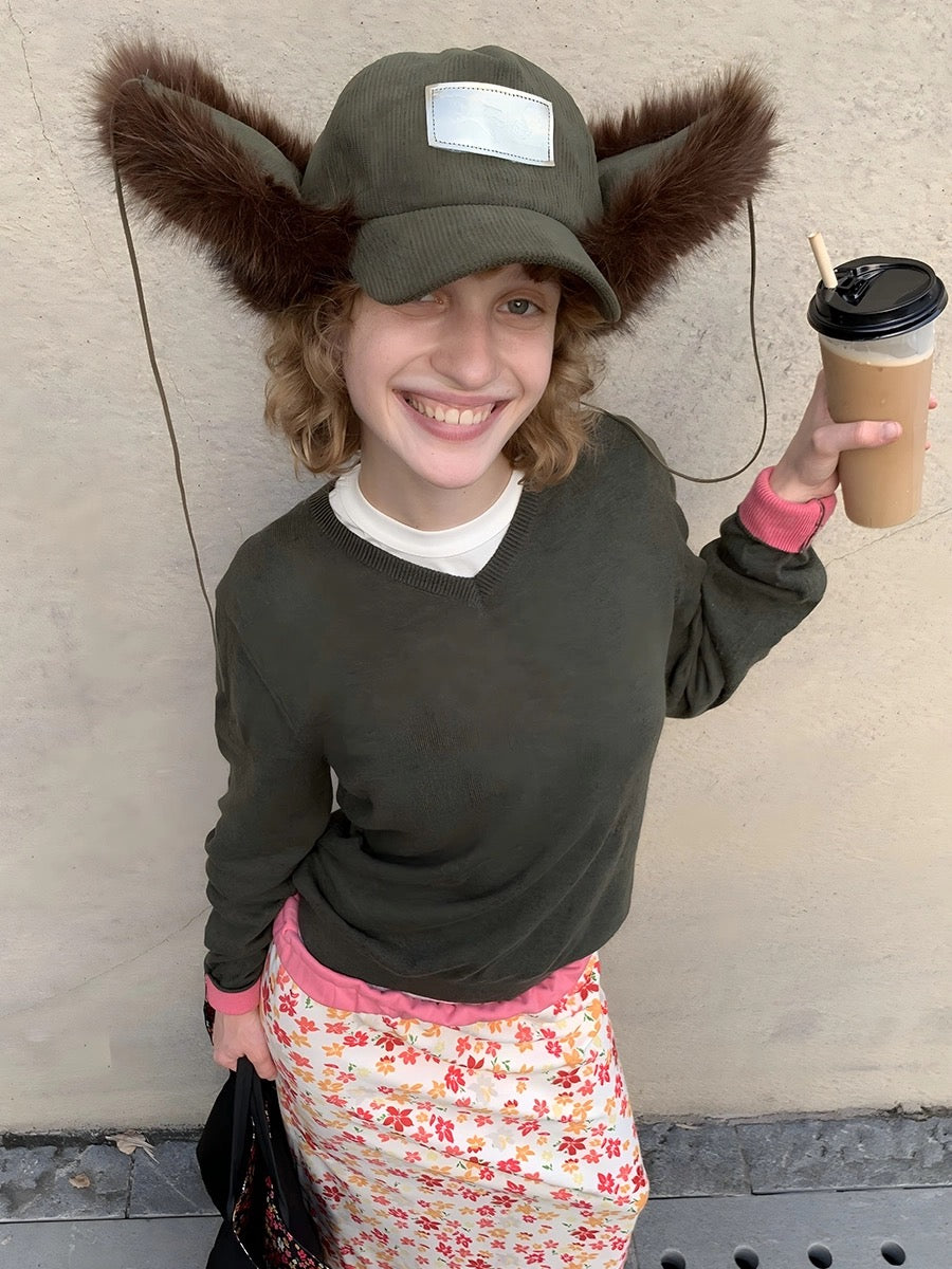 Furry ear flap cap